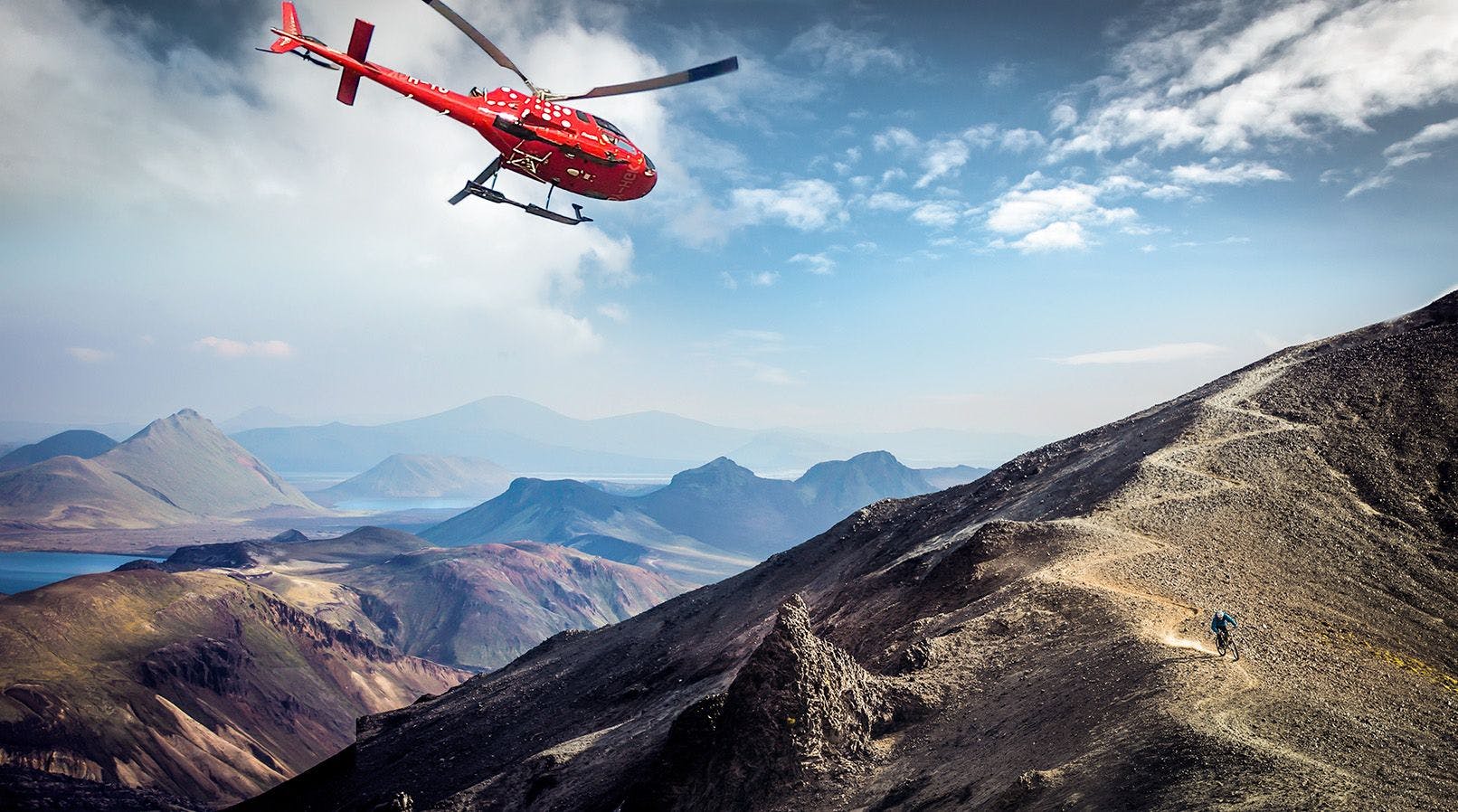 Helicopter flying over a mountain range