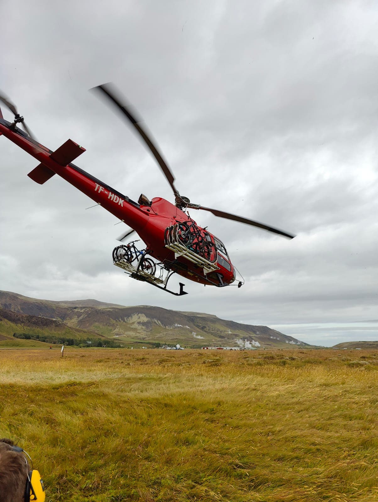 Helicopter flying over a mountain range