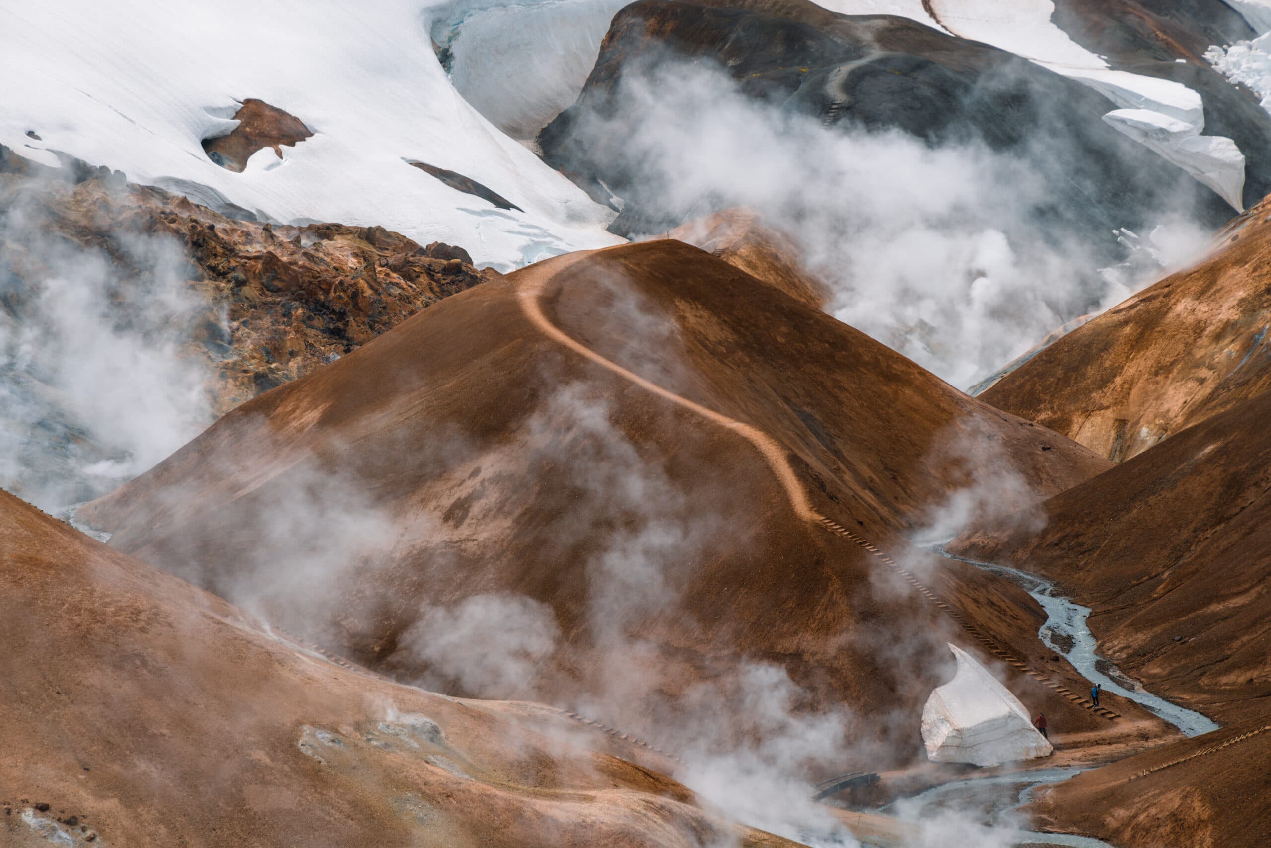 Helicopter flying over a mountain range