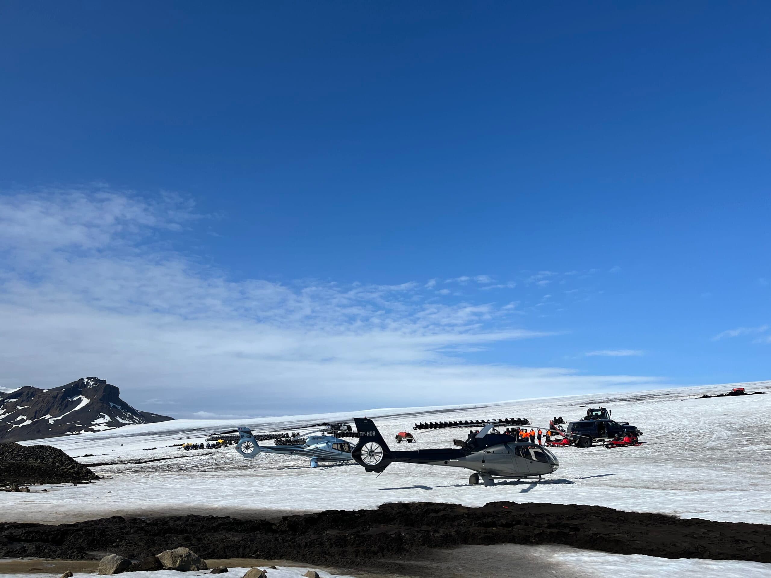 Helicopter flying over a mountain range